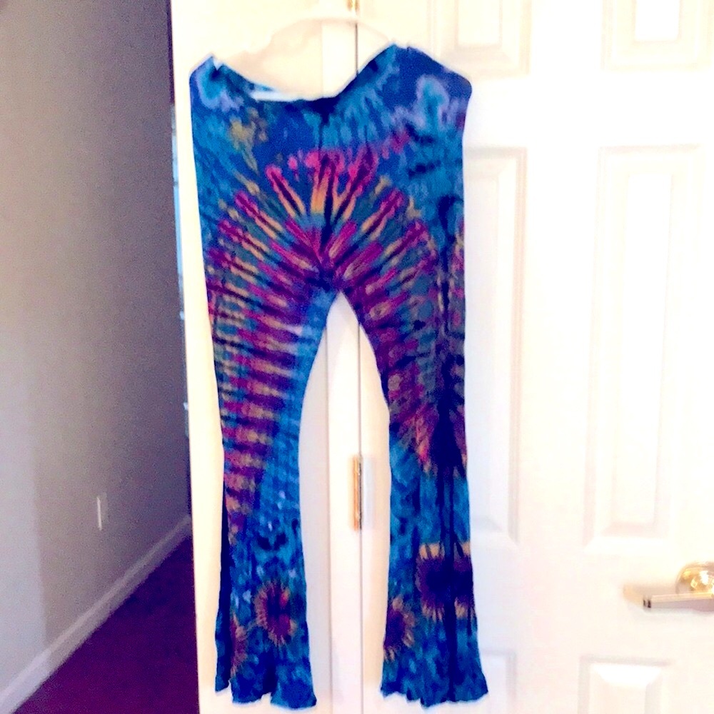 Tuscan Tango tie dyed flare bottom spandex leggings. Each pair made are unique.